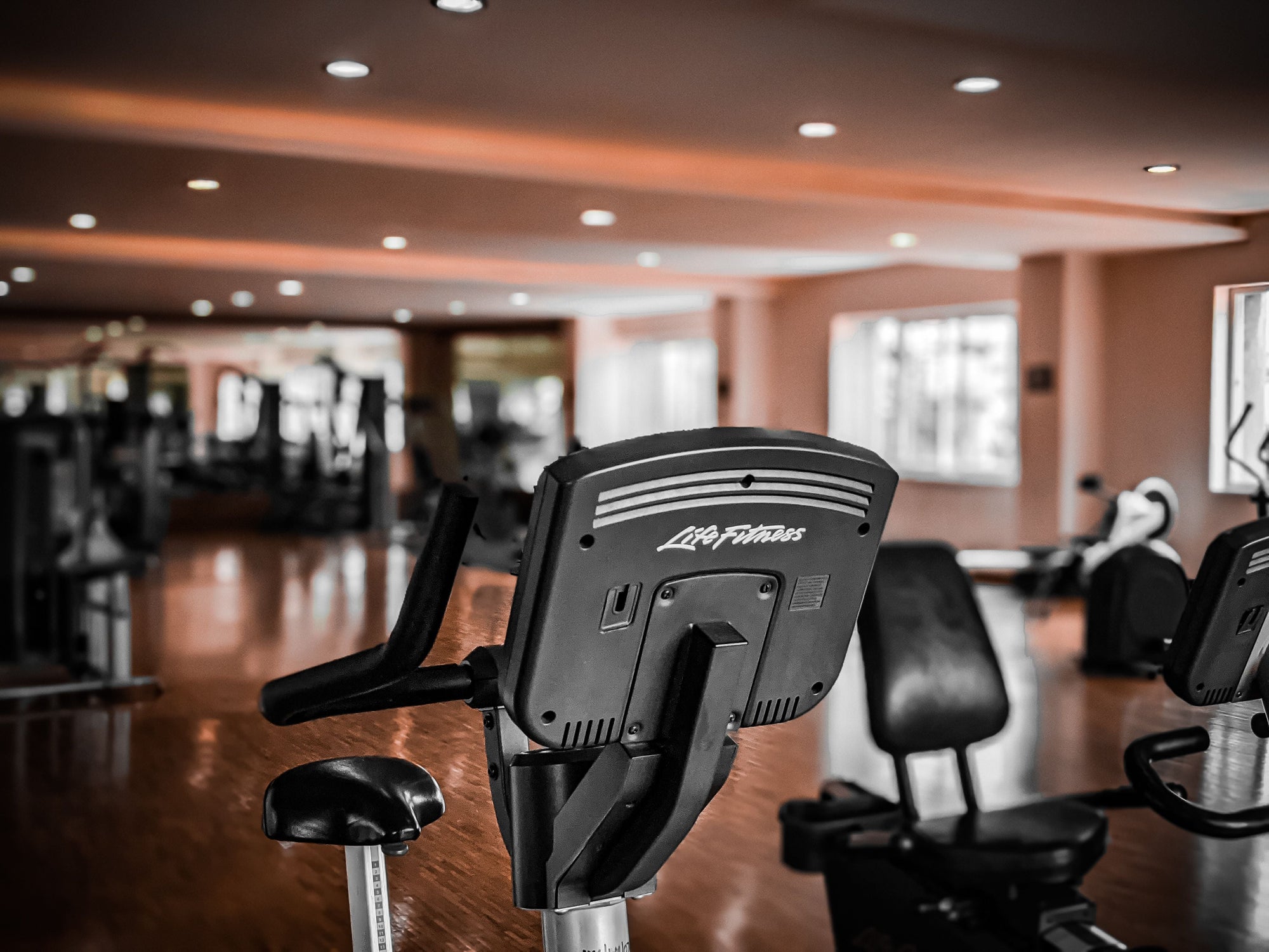 Commercial cardio equipment in a gym being maintained on a scheduled service programme