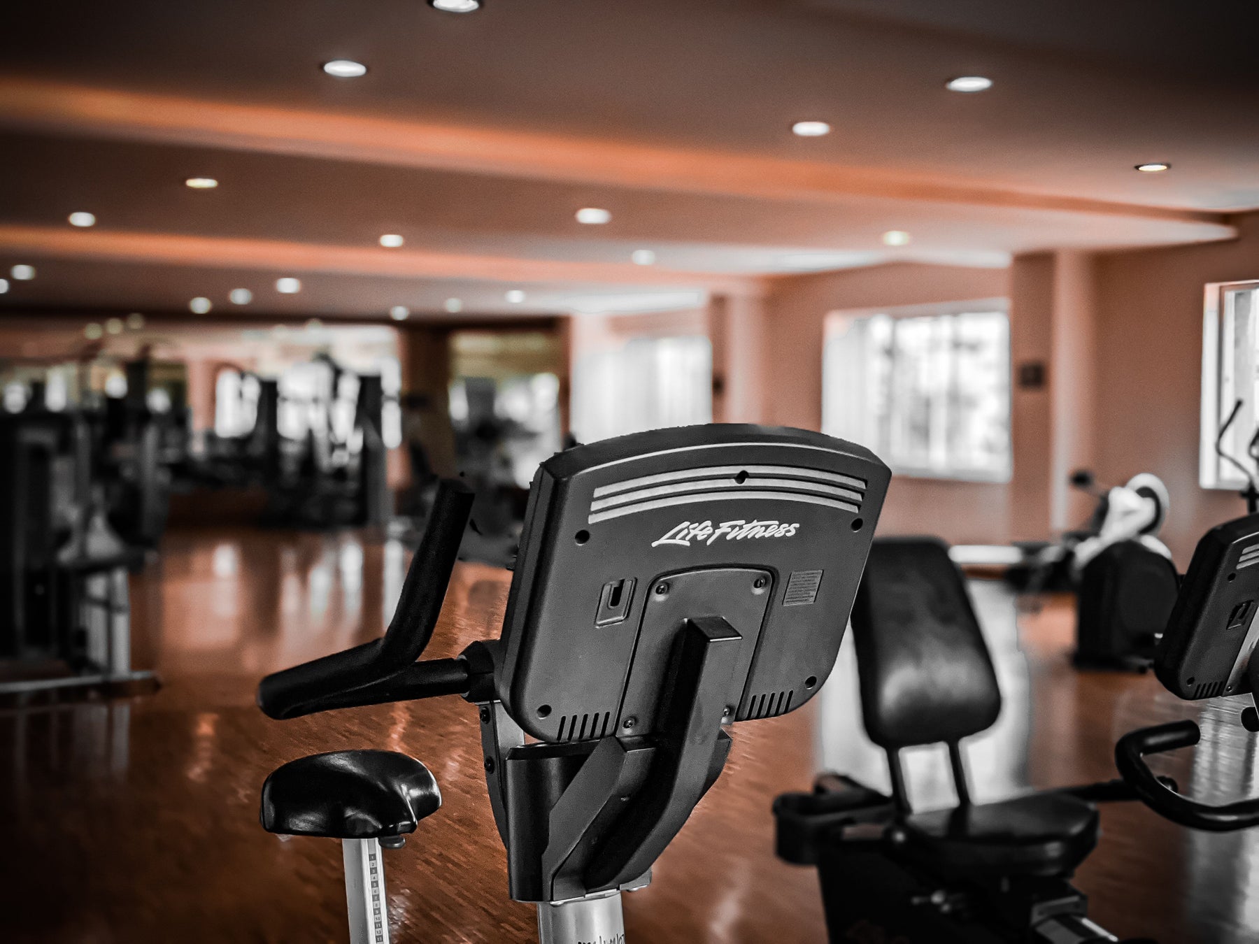 How often should commercial gym equipment be serviced?